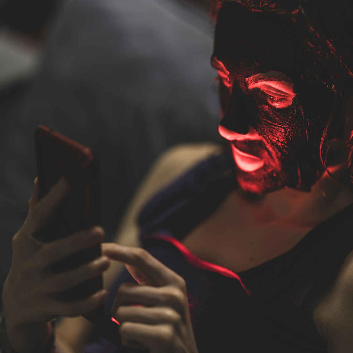 A man's face illuminating red from irritated skin.